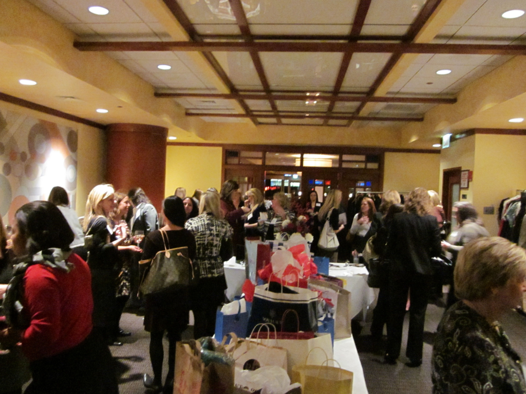 Women from a variety of professions gathered at the Women Helping Women event in support of Volunteers of America of Illinois’ Dress for Success Closet, where women military veterans can get the professional clothing they need for job interviews.